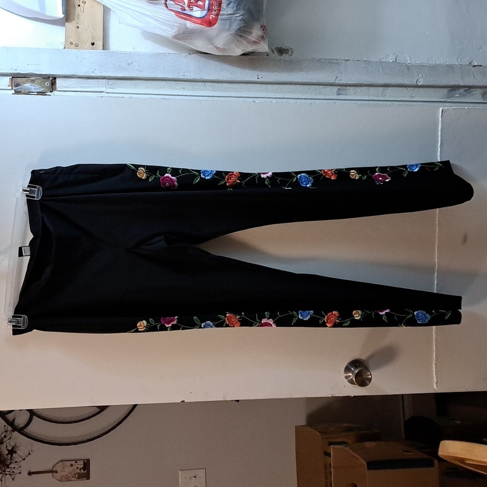 Moda International black pants with flowers on the side of the pant legs size 12
